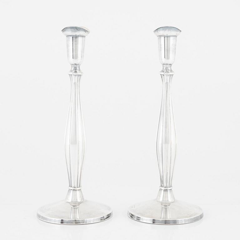 Tore Eldh, a pair of silver candlesticks, Ceson Guldvaru Ab, Gothenburg 1962.