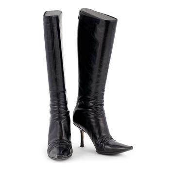 528. JIMMY CHOO, a pair of black leather boots. Size 38.
