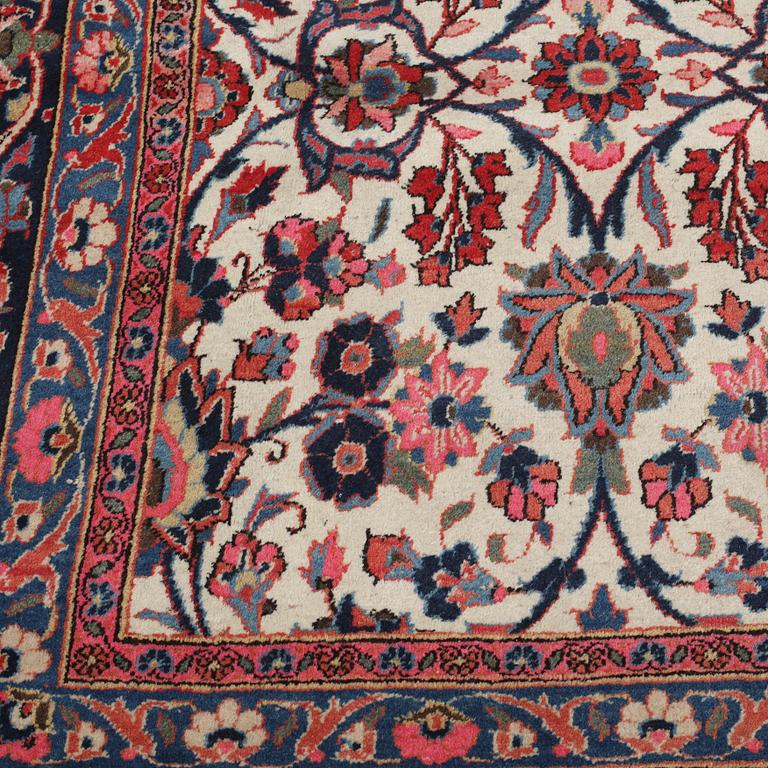 A persian rug, semiantique, ca 320 x 228 cm.