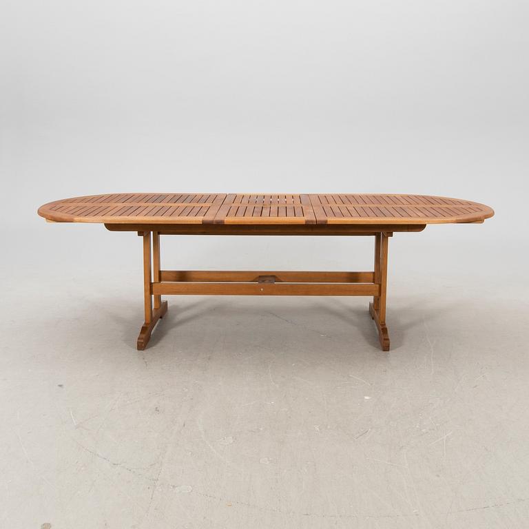 A 9 pcs stained teak garden suite by Brafab around 2000.