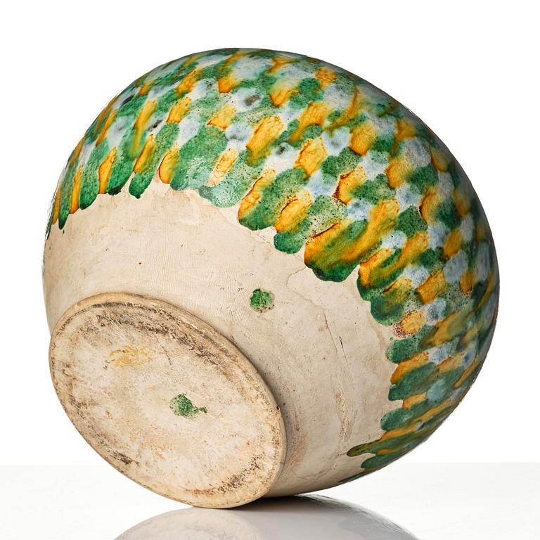 A sancai-glazed pottery jar, Tang dynasty (618-907).