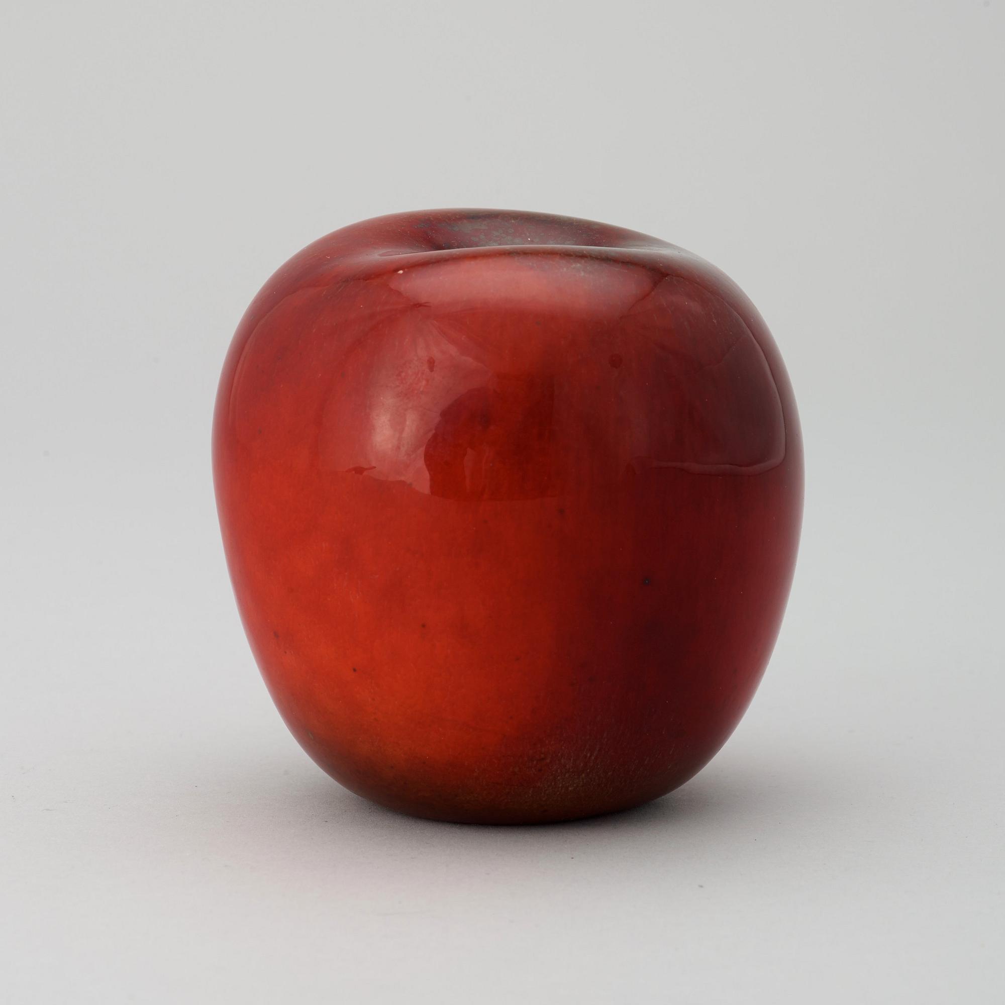 A Hans Hedberg faience apple, Biot, France.