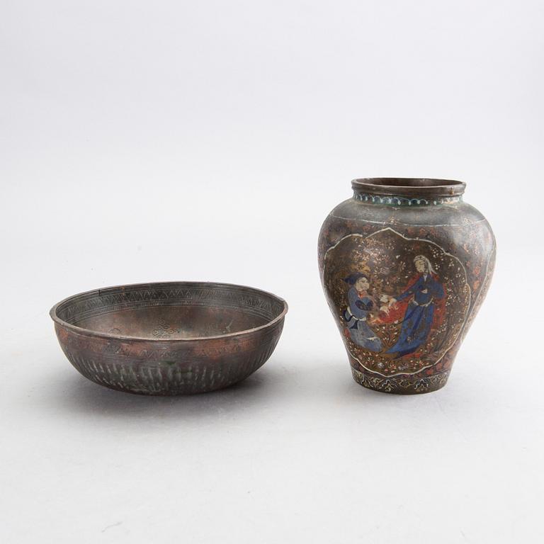 A Persian 19th century metal bowl and vase.