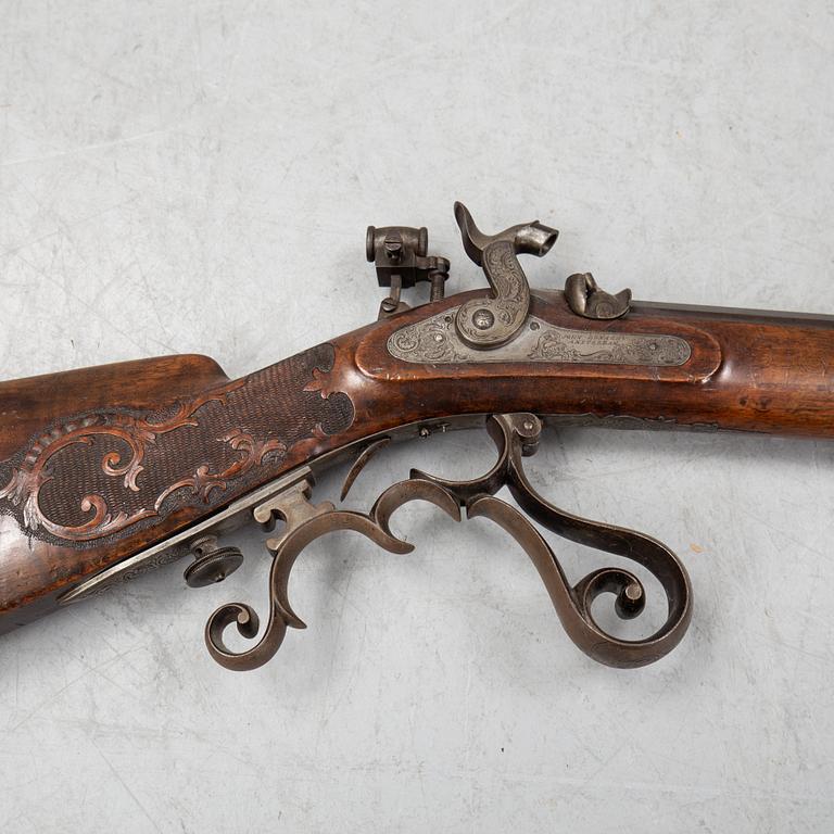 A pecussion rifle by John Donaghy, Amsterdam (1820-50).
