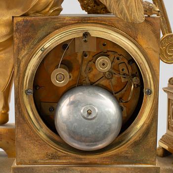 An Empire mantel clock, first half of the 19th century.