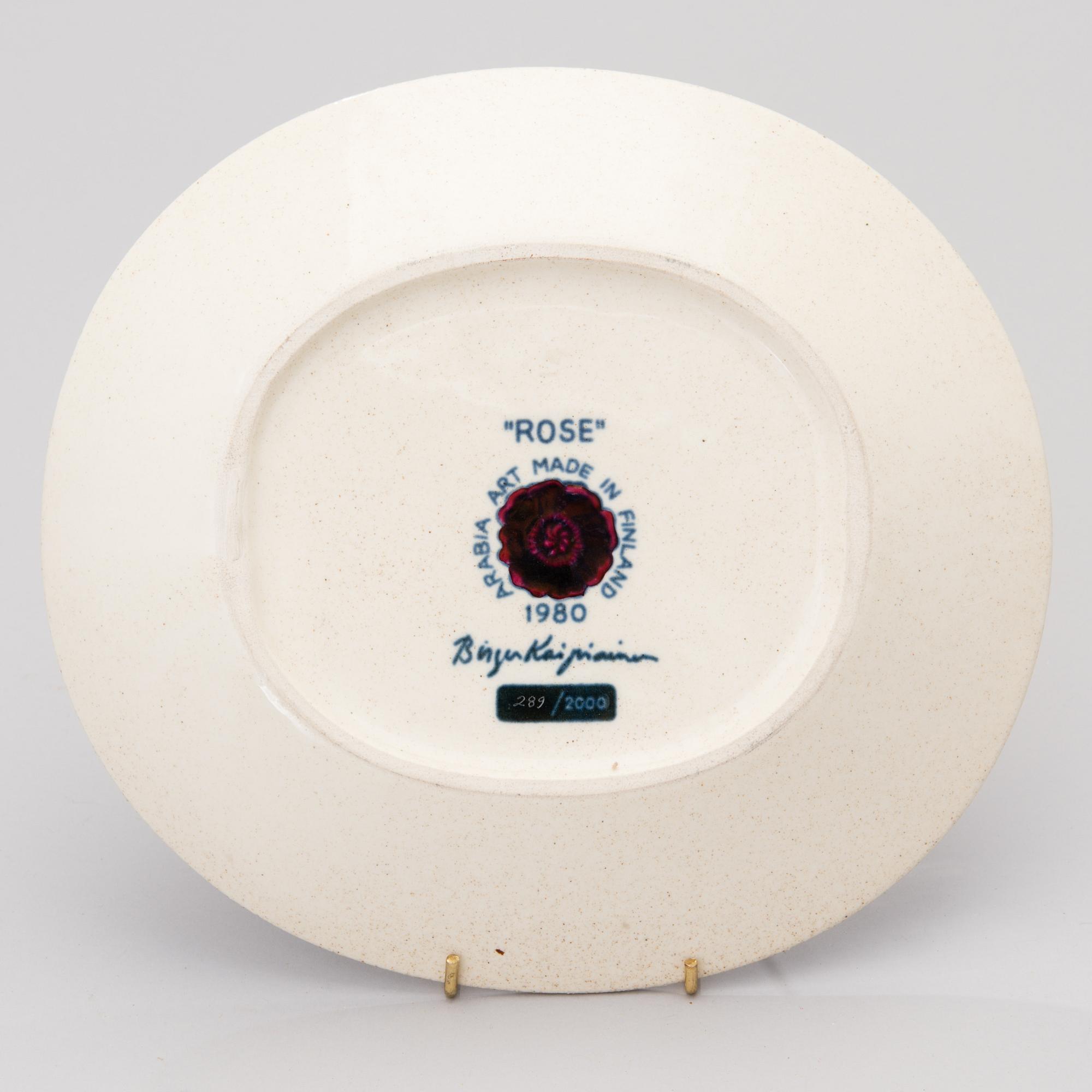 A ceramic Rose wall plate, marked Arabia Art Made in Finland