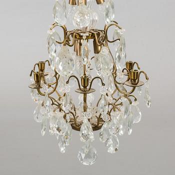 A ROCOCO STYLE CHANDELIER, second half of 20th century.