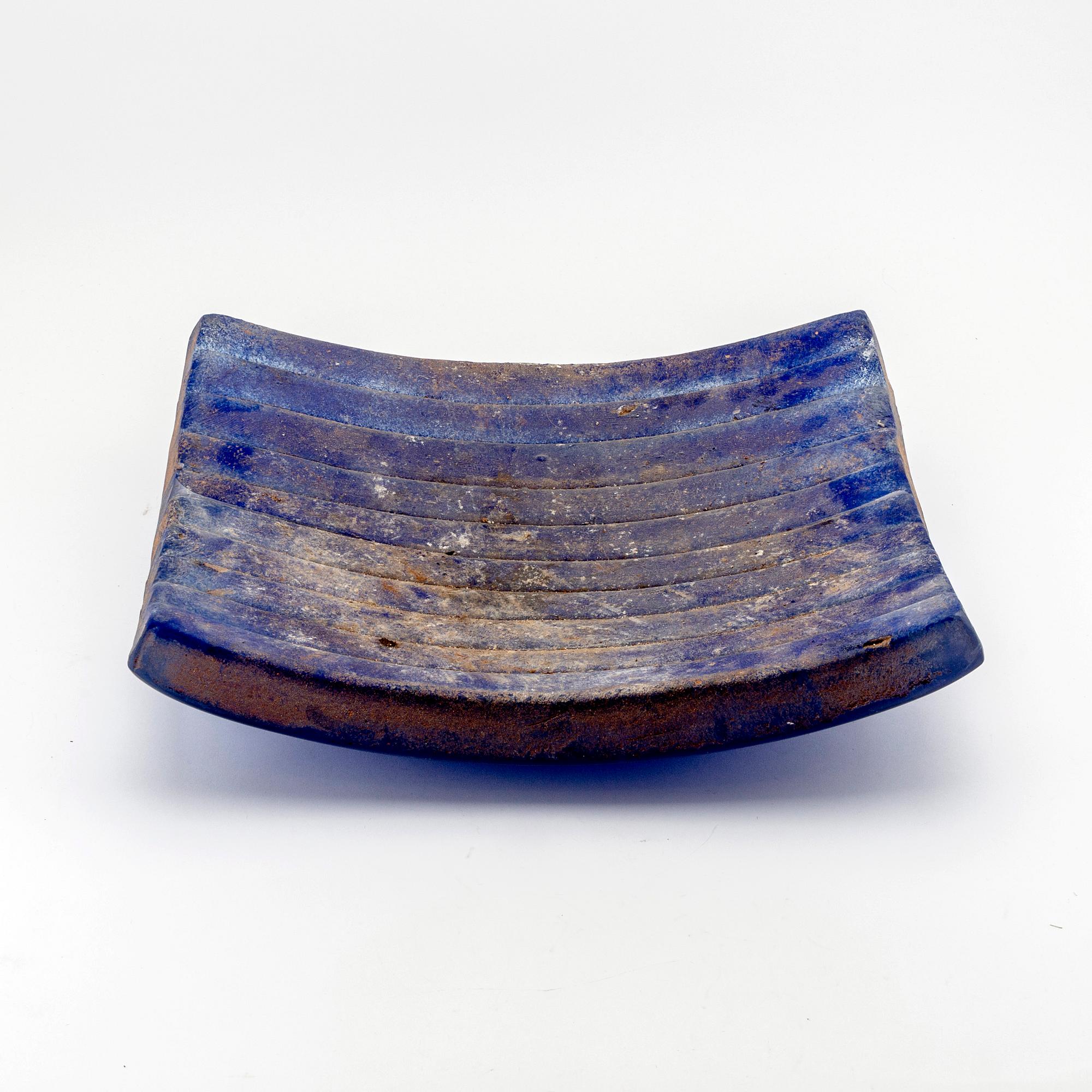 A Paula Barton signed and dated glass plate.