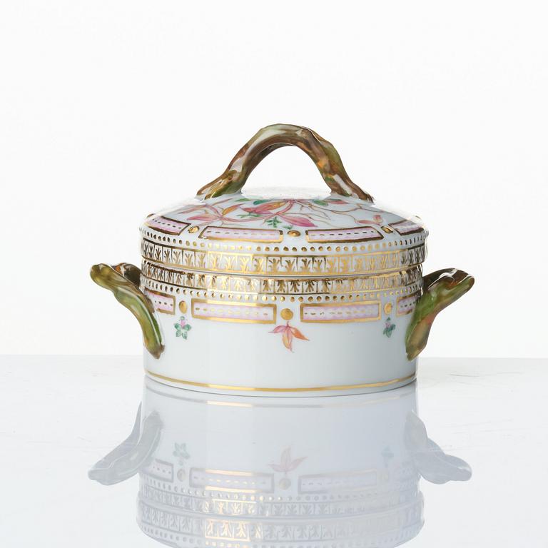 A set with a Royal Copenhagen 'Flora Danica' triangular dish, a sugar bowl with cover and three small dishes, Denmark,