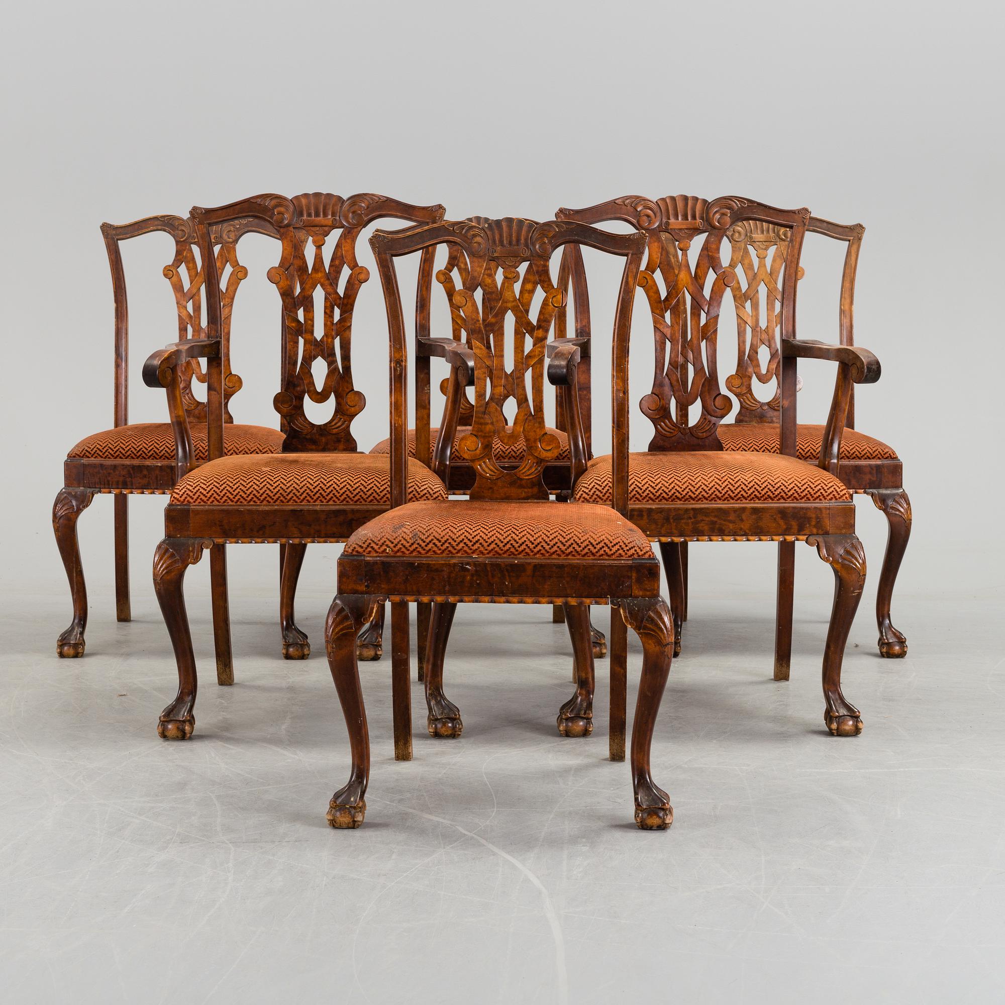 A 1920's 7 piece Chippendale-style dining group.