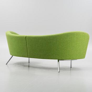 A 'Orgy' sofa with pouf by Karim Rashid for Offecct.