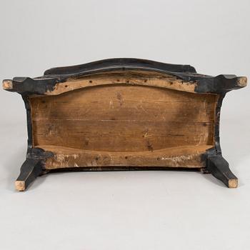 An 18th-Century chest of drawers.