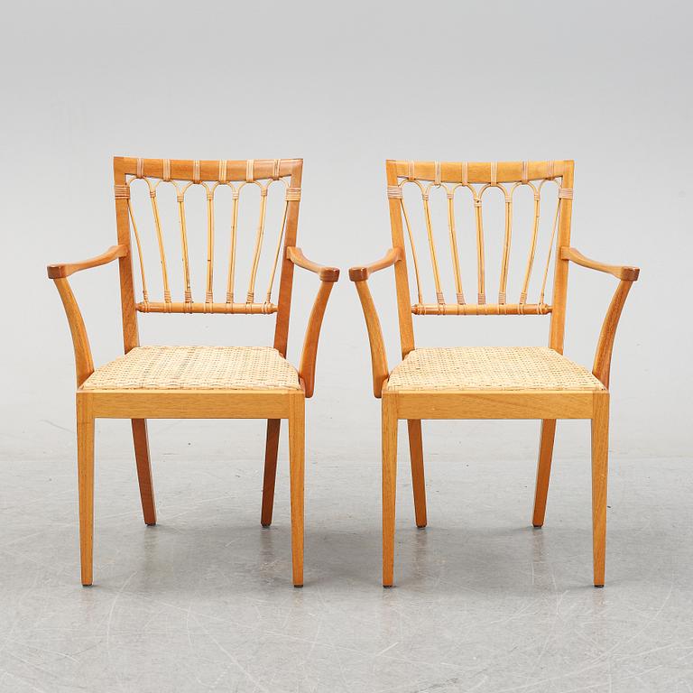 A pair of mahogany armchairs, model 1165, designed by Josef Frank in 1946 for Firma Svenskt Tenn.