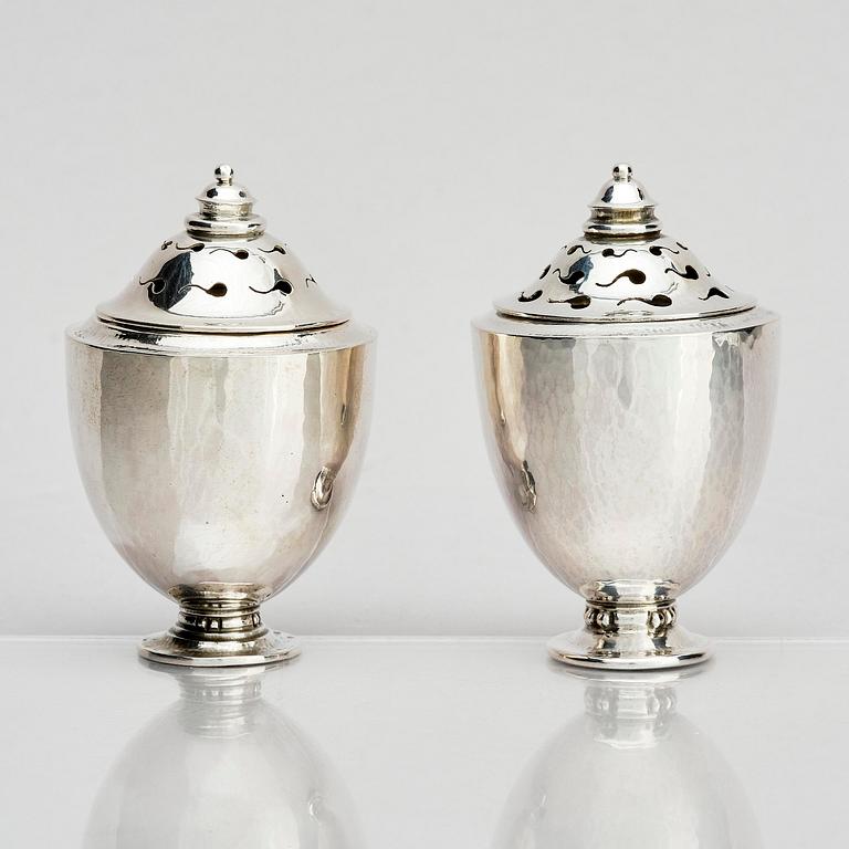 Georg Jensen, a pair of silver casters, design Johan Rohde, Copenhagen 1915-1921.