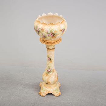 An early 20th century pedestal and flowerpot.