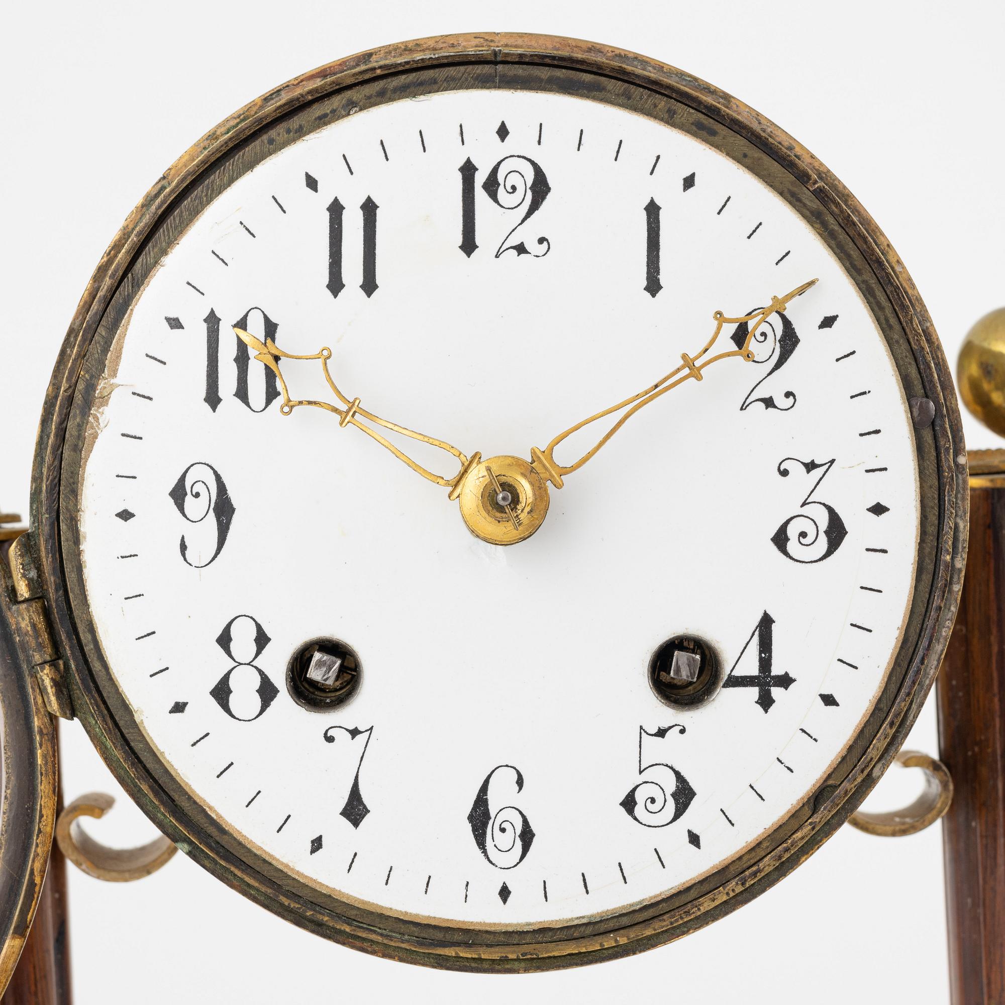 A classic style mantle clock, 19th century.