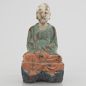 A Louhan, carved and painted wood, China, late Qing dynasty.
