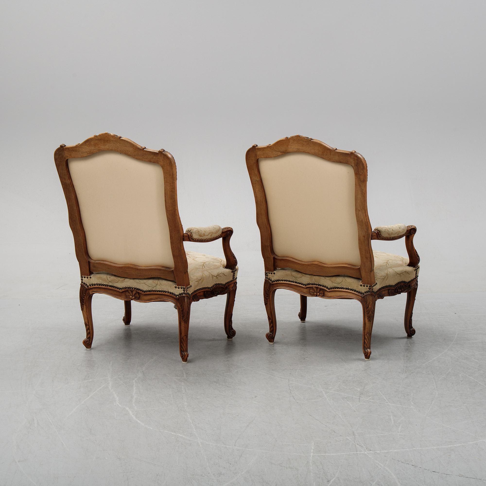 A pair of Louis XV style armchairs from early 20th Century.