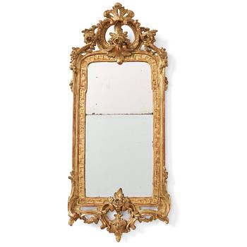 93. A Swedish rococo giltwood mirror, Stockholm, later part 18th century.