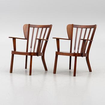 Christian E Hansen, a pair of armchairs, Fritz Hansen, Denmark.