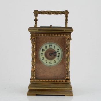 A brass carriage clock, first half of the 20th century.
