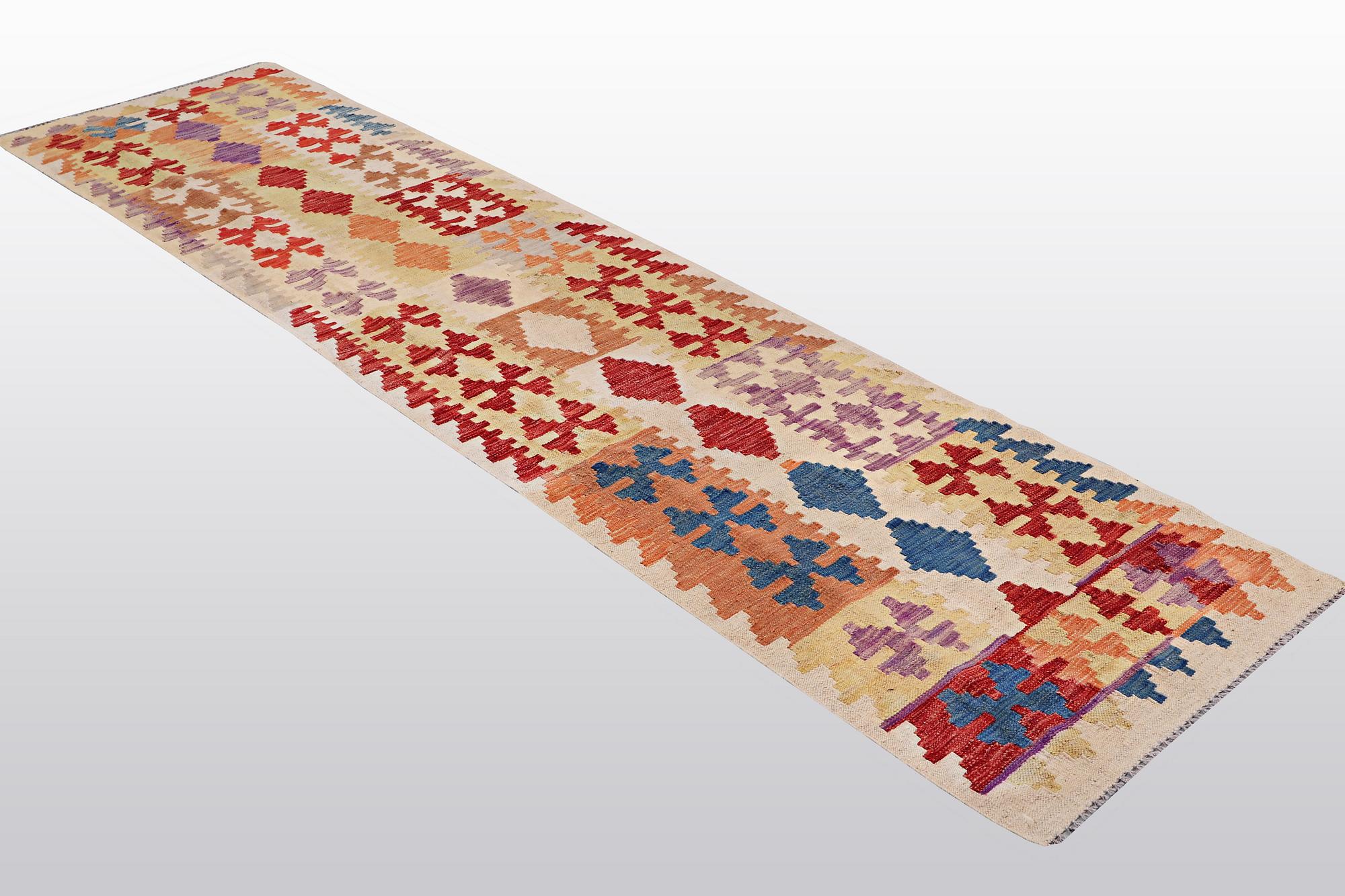 A runner, kilim, ca 298 x 74 cm.