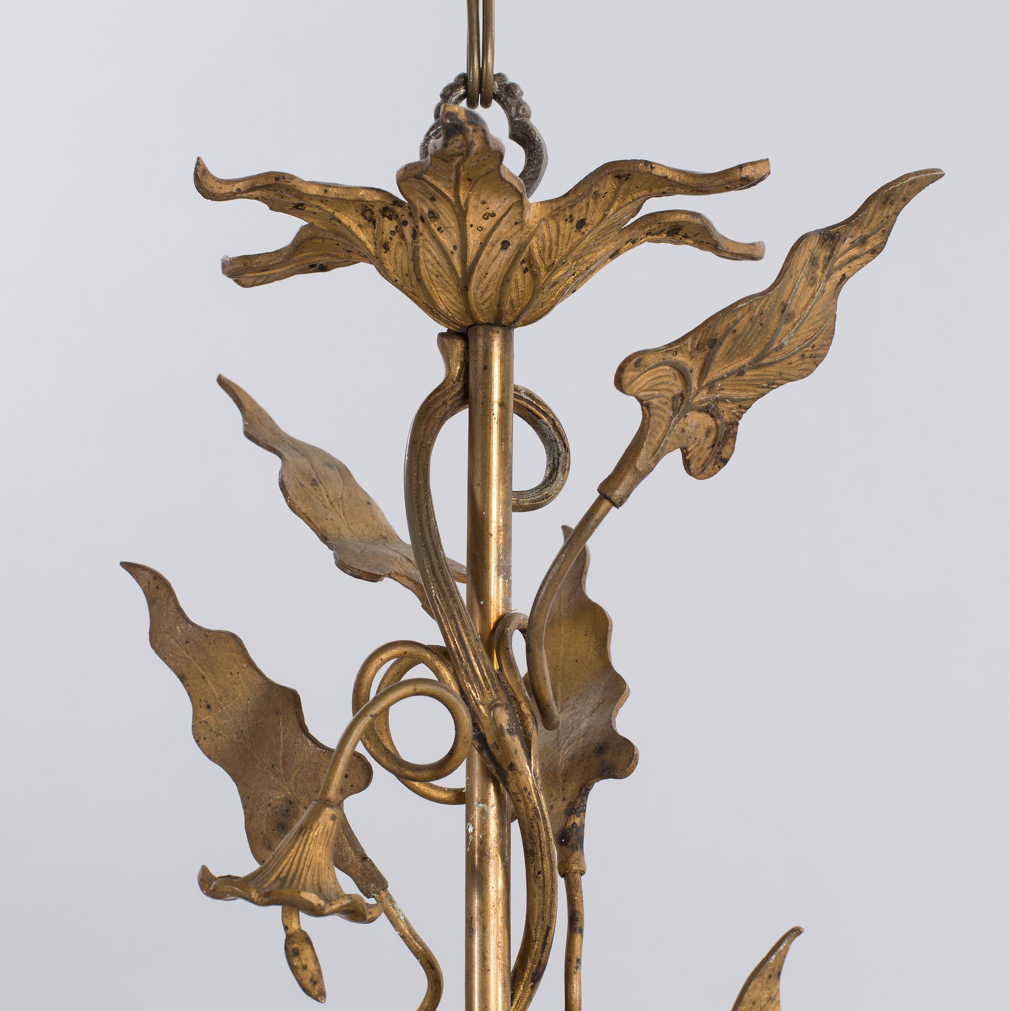 An app. 1900 french brass/metal chandelier.