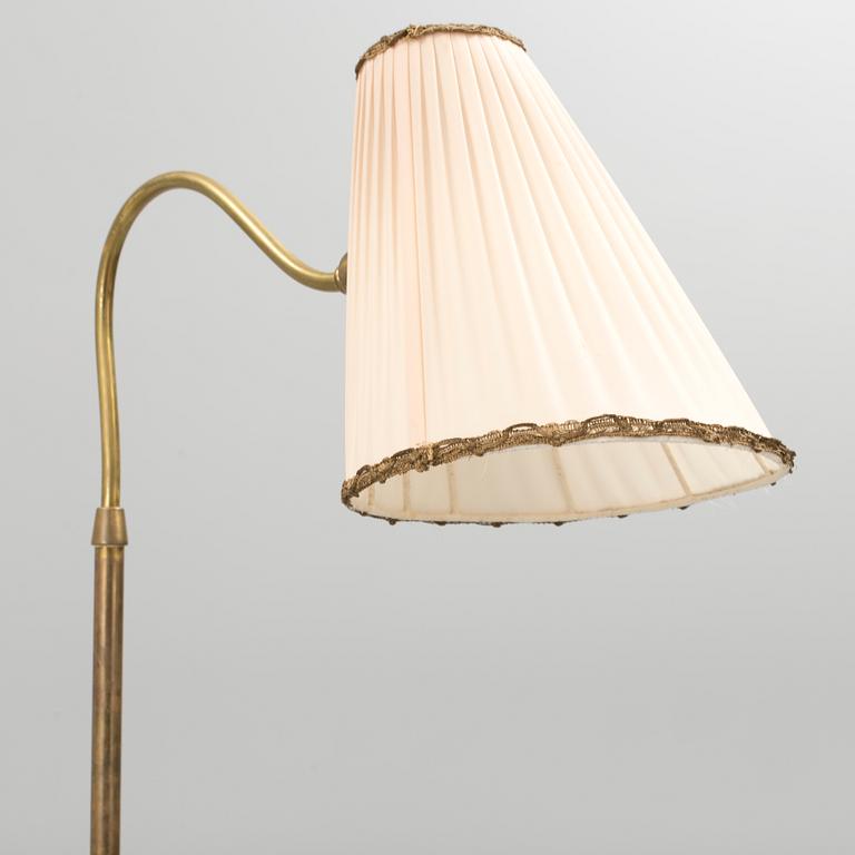 A Swedish 1930/40s brass floor lamp marked B E M.