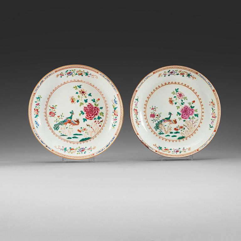 A pair of famille rose 'double peacock' dishes, Qing dynasty, Qianlong (1736-95).