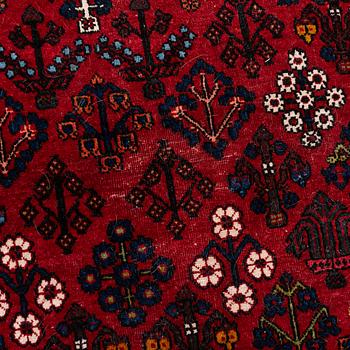 An oriental rug, c. 365 x 285 cm.
