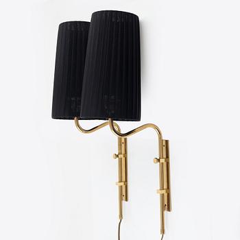 A pair of brass wall lights from Bergboms, second half of the 20th Century. Marked.