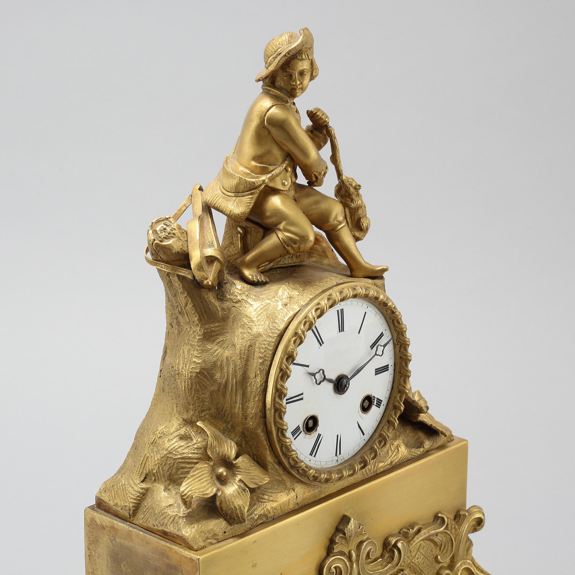 A late Empire table clock, clockwork marked "Japy Freres", made in the mid/second half of the 20th century.