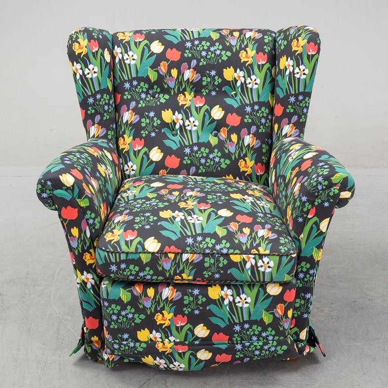 A sofa and wingback chair, later part of the 20th Century.
