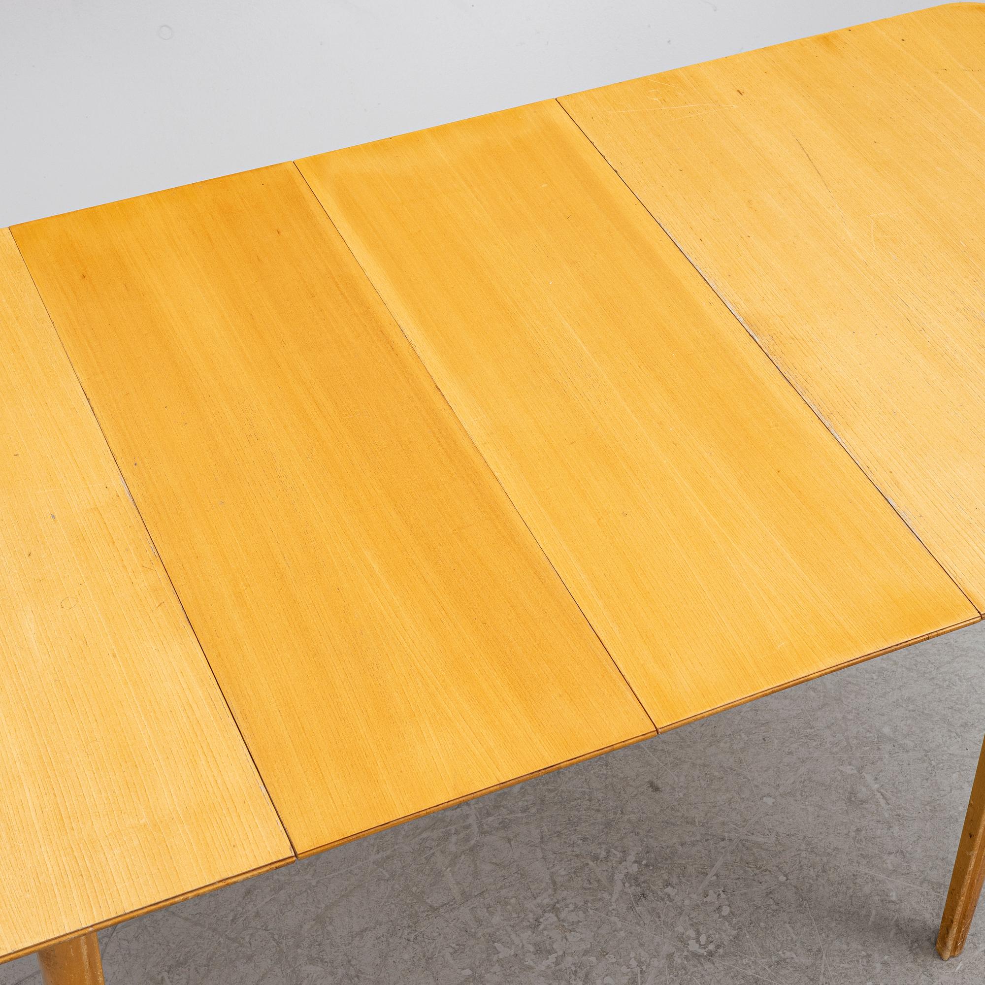 A dining table with six chairs, Sweden, 1940's.