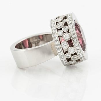 A Gaudy platinum ring set with a faceted tourmaline.