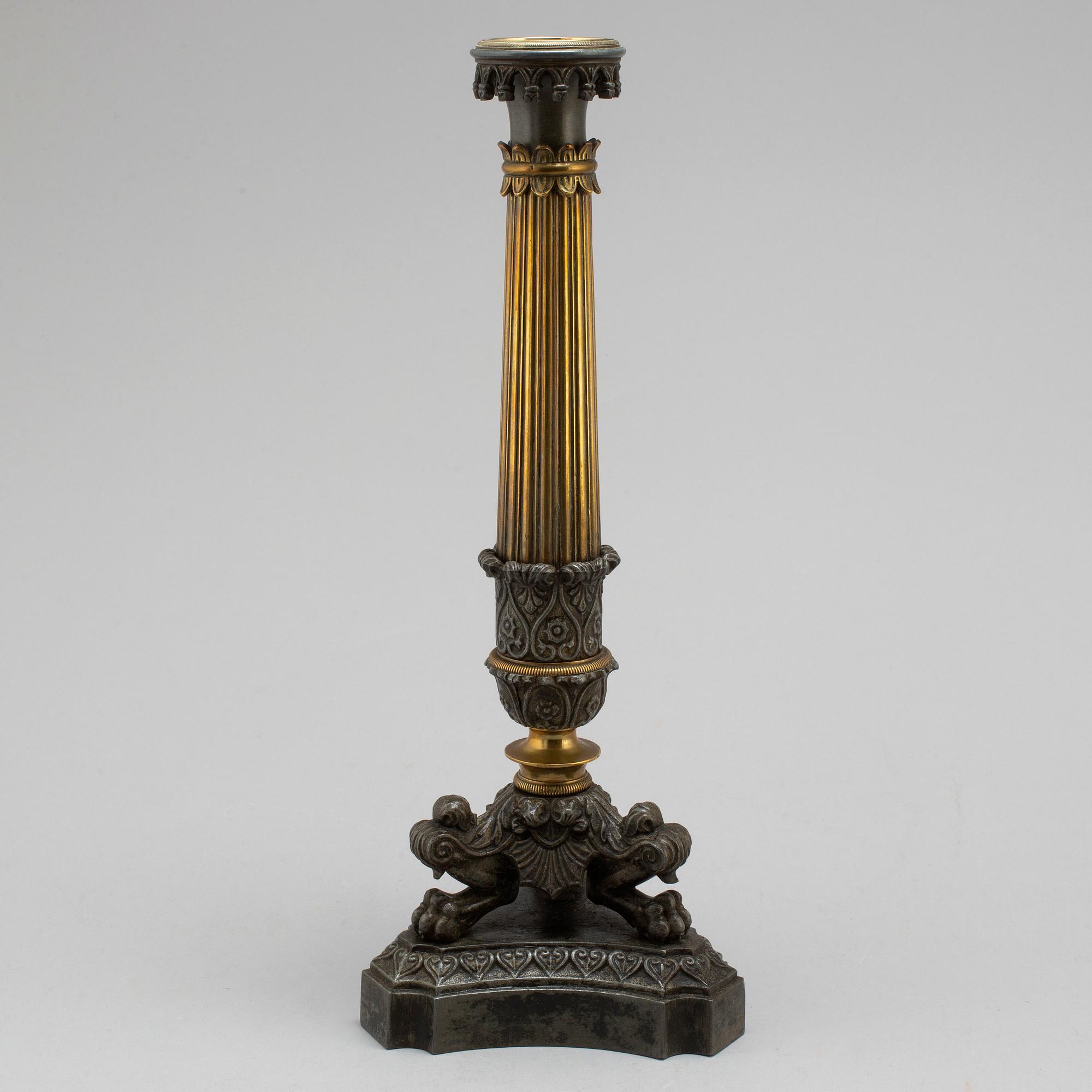 A mid 19th century late empire candlestick.