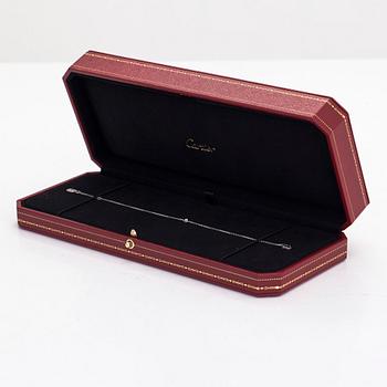 Cartier, an 18K white gold 'd'Amour' bracelet with a diamond, ca. 0.04 ct.