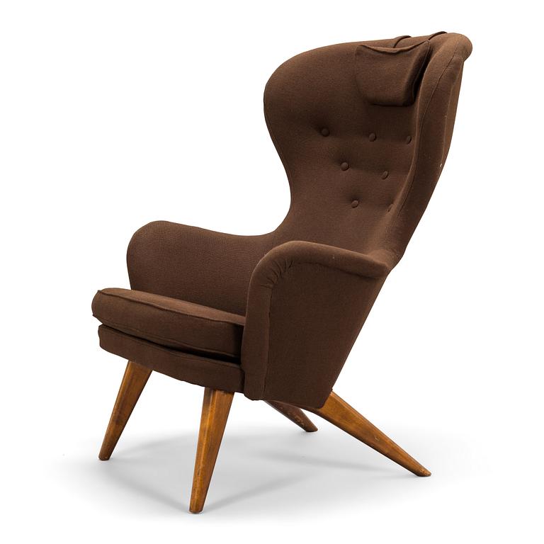 Carl Gustaf Hiort af Ornäs, A mid-20th-century armchair 'Siesta' manufacturer Puunveisto Oy - Träsnideri Ab, Finland.