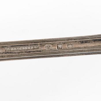 A Swedish silver gilt spoon, and a silver serving spoon, 18-19th Century.