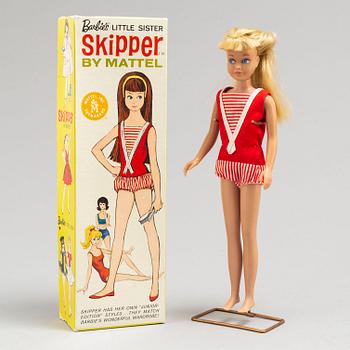 a set of 11 Barbiedolls and a collectors book ("Barbie her life & times" by Billyboy, 1987), Mattel 1960's-70's.