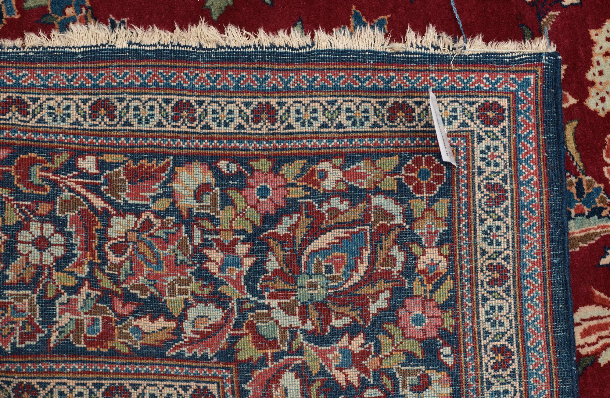 SEMI-ANTIQUE KASHAN. 208 x 133,5 cm.