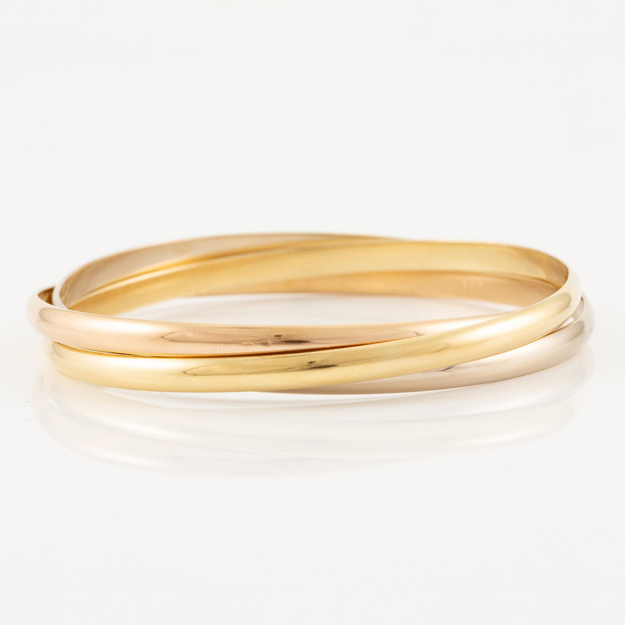 A Cartier bracelet "Trinity" 18K gold in three colours.