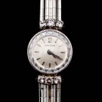 ARMBANDSUR, Omega, 18 k vitguld, med 6 briljantslipade diamanter, 1900-talets mitt. Total vikt med urverk 33 gram.