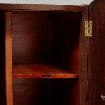 A cabinet from the first half of the 20th century.