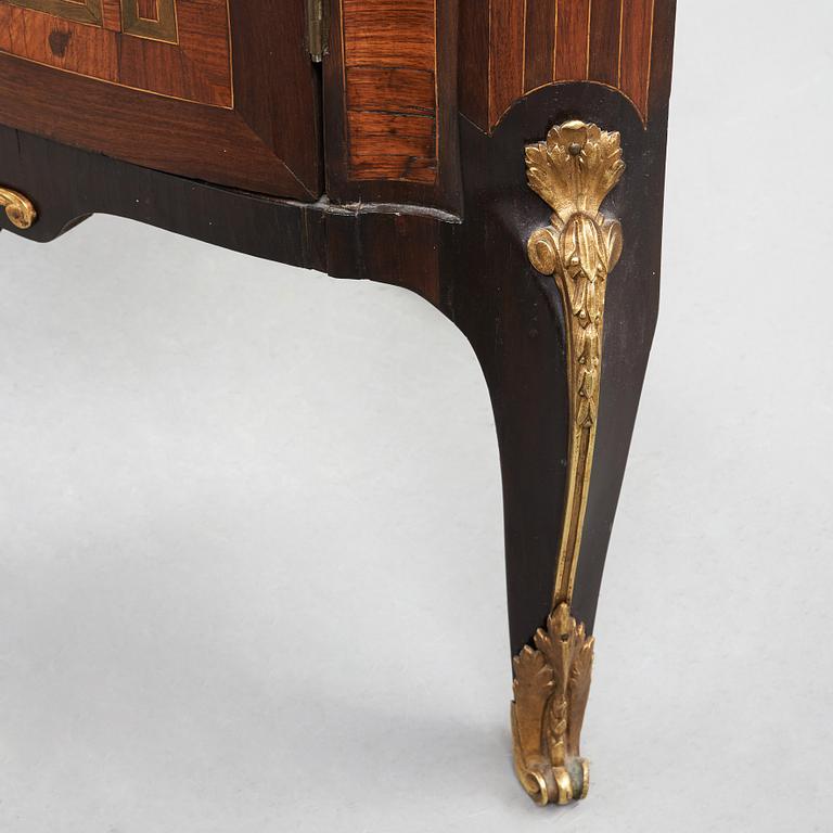 A pair of Louis XVI late 18th century corner cupboards by Léonard Boudin (1735-1804), master in Paris 1761.