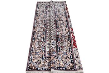 A carpet, Nain, part silk, 6 laa, c. 303 x 184 cm.
