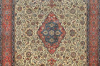 A Sarouk carpet, c. 400 x 284 cm.