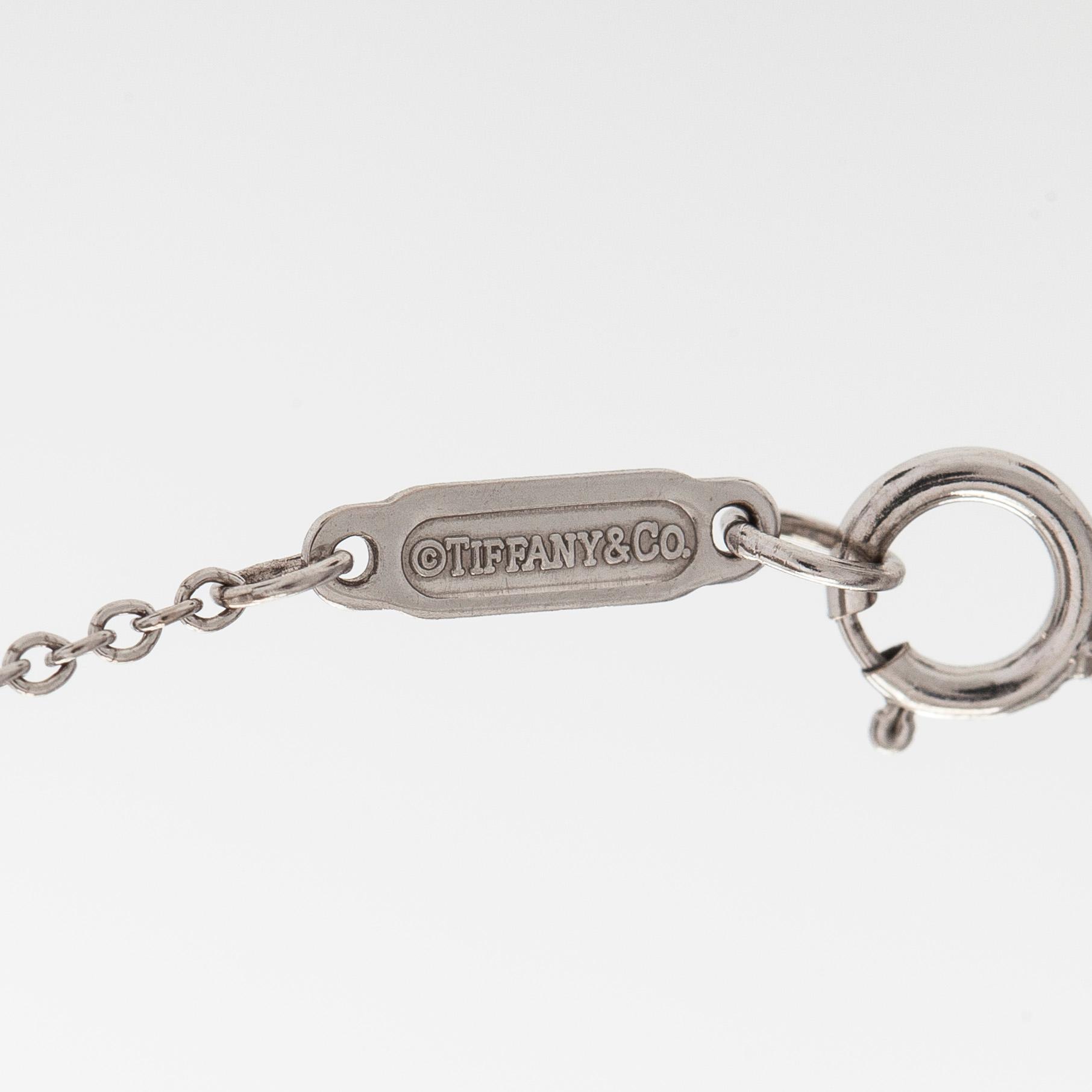 Tiffany & Co, halsband "Metro Cross", 18K vitguld och diamanter.