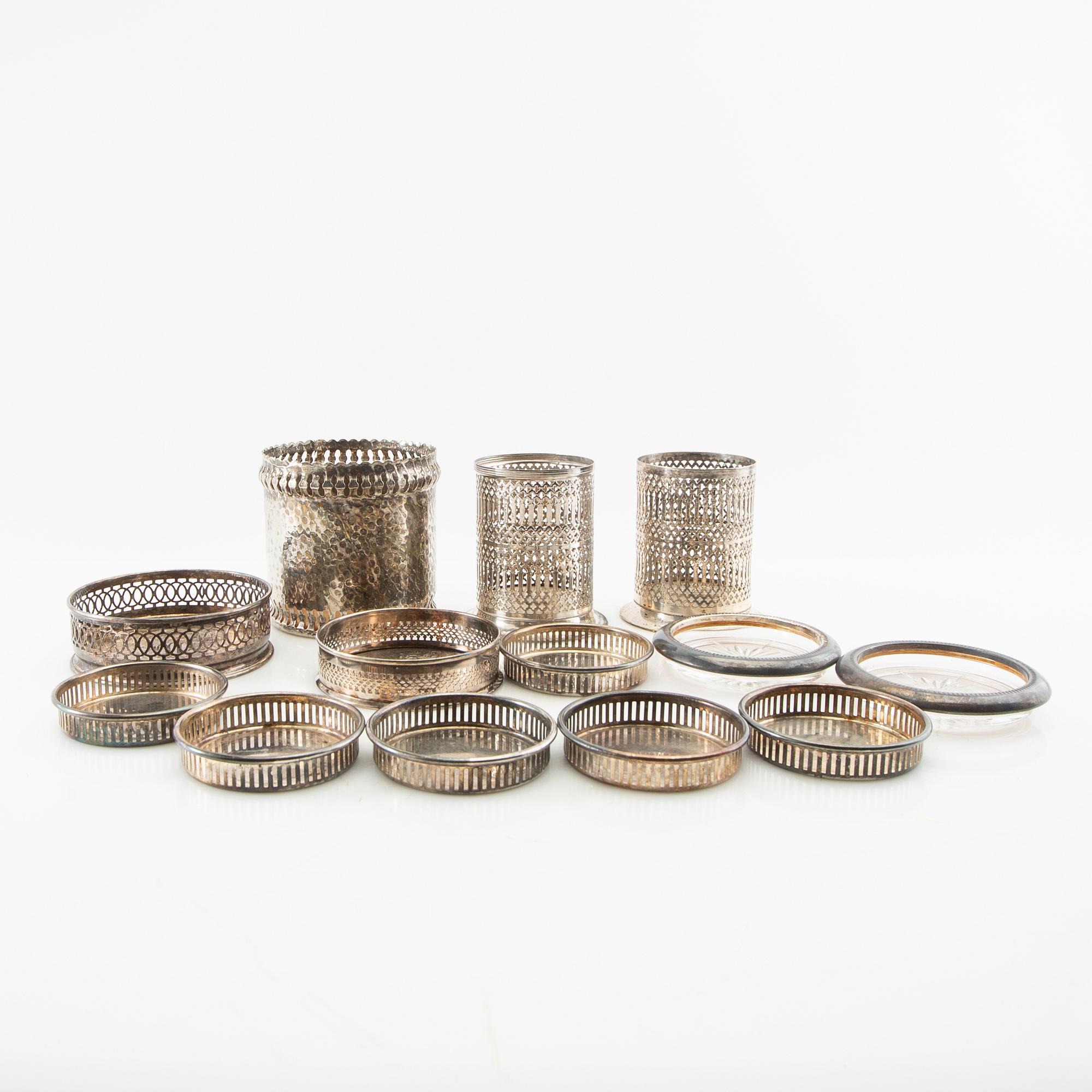 Coasters/Bottle holders 13 pcs first half of the 20th century, silver plate.