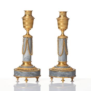 A pair of Louis XVI ormolu and marble cassolettes, late 18th century.